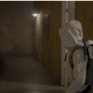 Young Charlie (Phoenix Lamorae) comes face to face with a shadow person (performed by Antonio Granda Manzano)