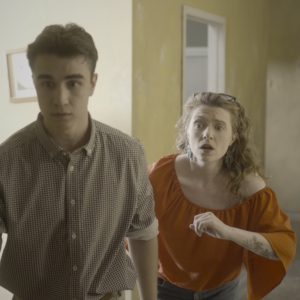Glenn (Jeremiah Brannan) and Lena (Nicole Unger) try to escape their own story