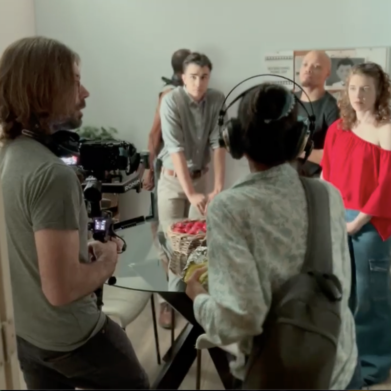 Director Ana Clavell sets the shot with Director of Photography Tim Harbour as actors Jeremiah Brannan (Glenn), Jonathon James (Denny), and Nicole Unger (Lena)  await instructions.